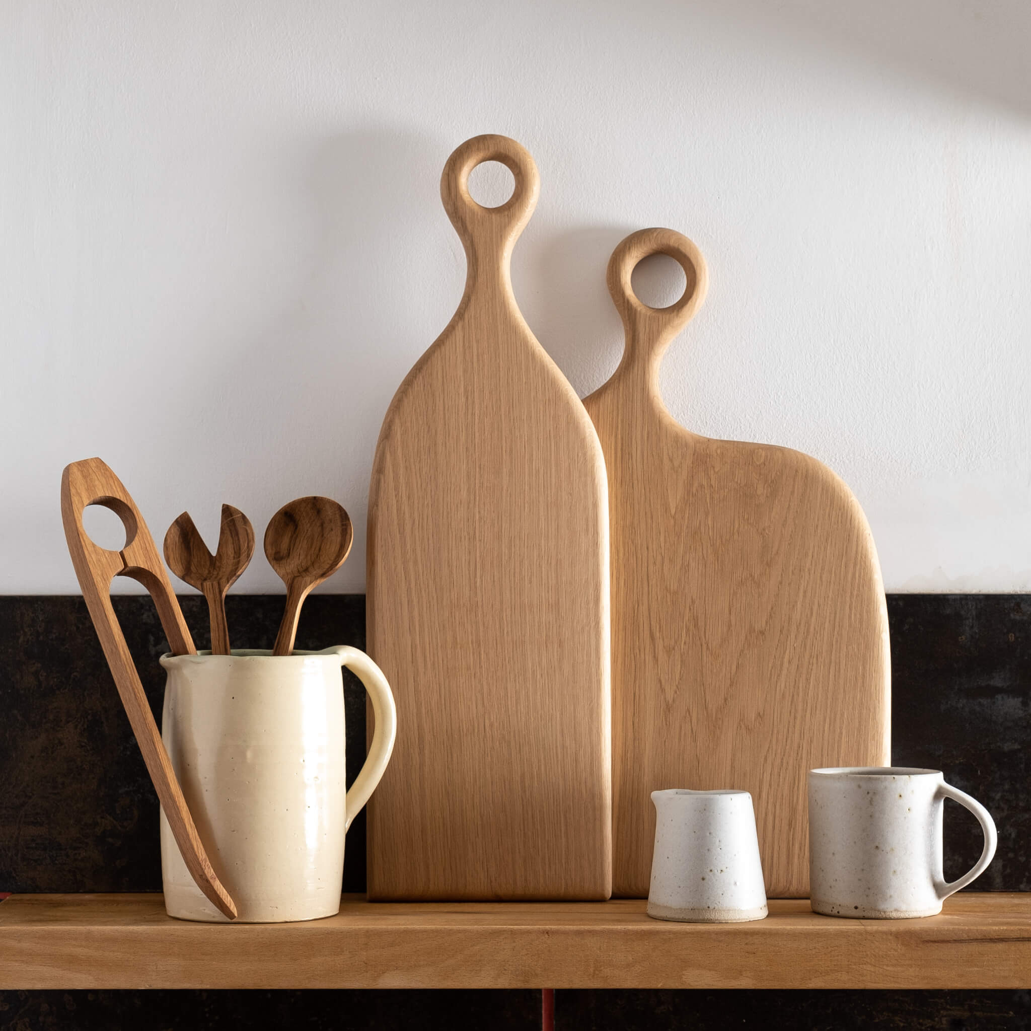 Forge Creative Wide Oak & Narrow Oak Choppng Boards on shelf with small jug and mug.